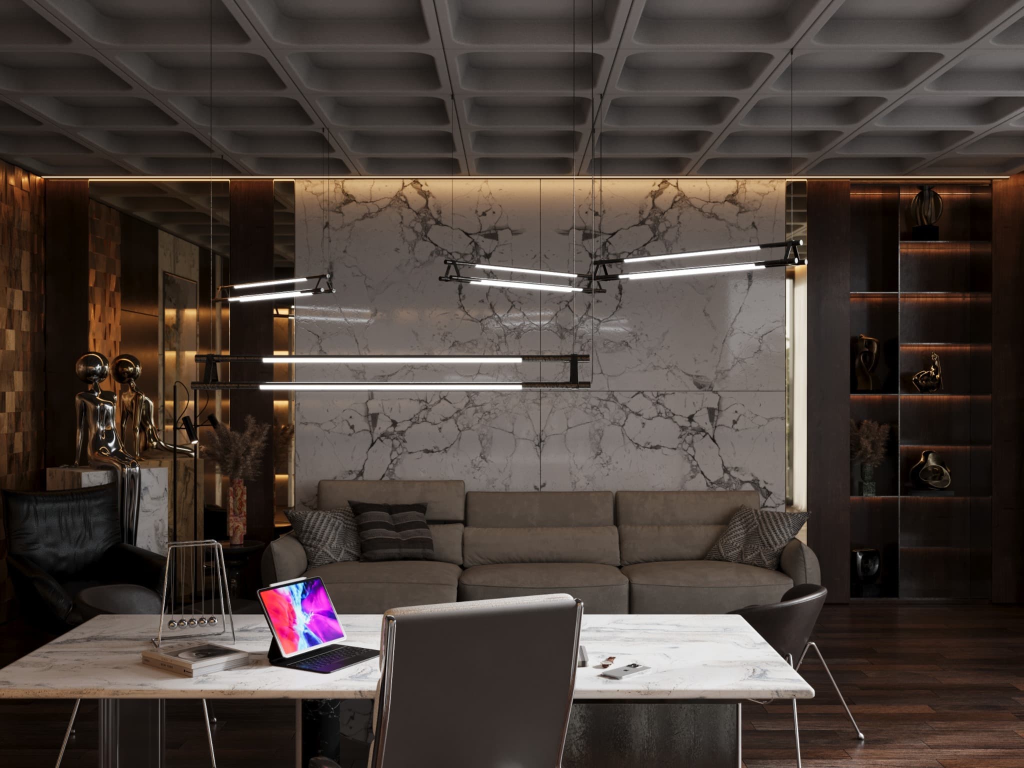 View across the desk to a sofa against a pale stone-effect wall