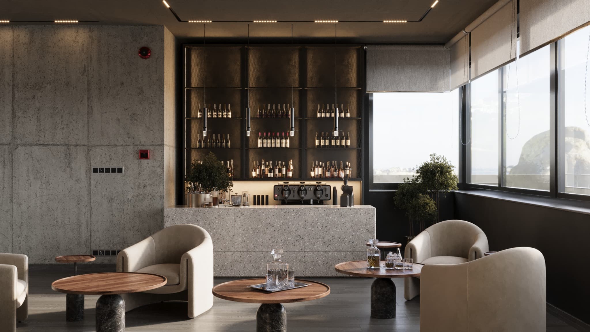 Pale armchairs around individual tables in front of an illuminated bar