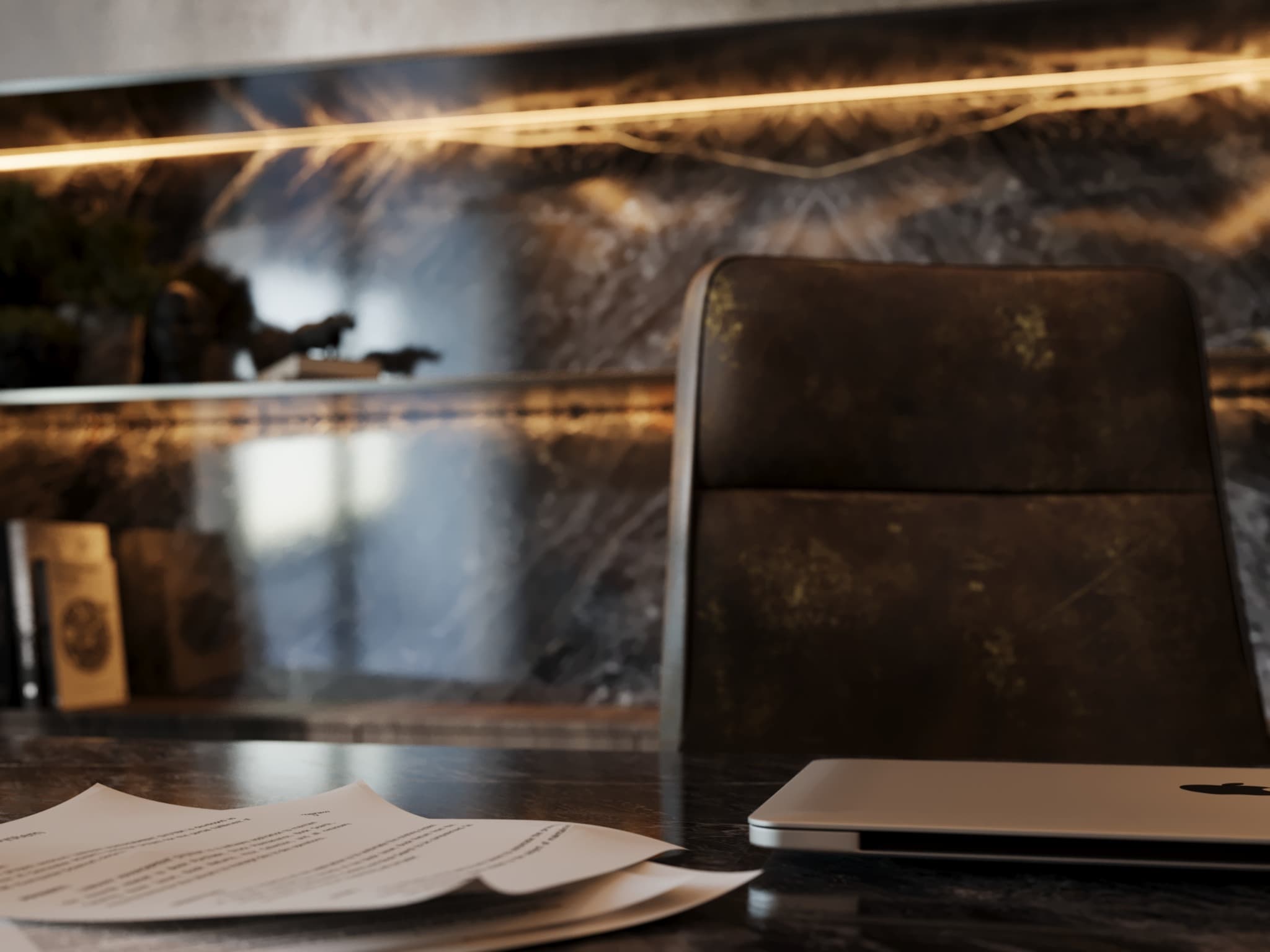 Desktop study of papers and a laptop in shallow focus