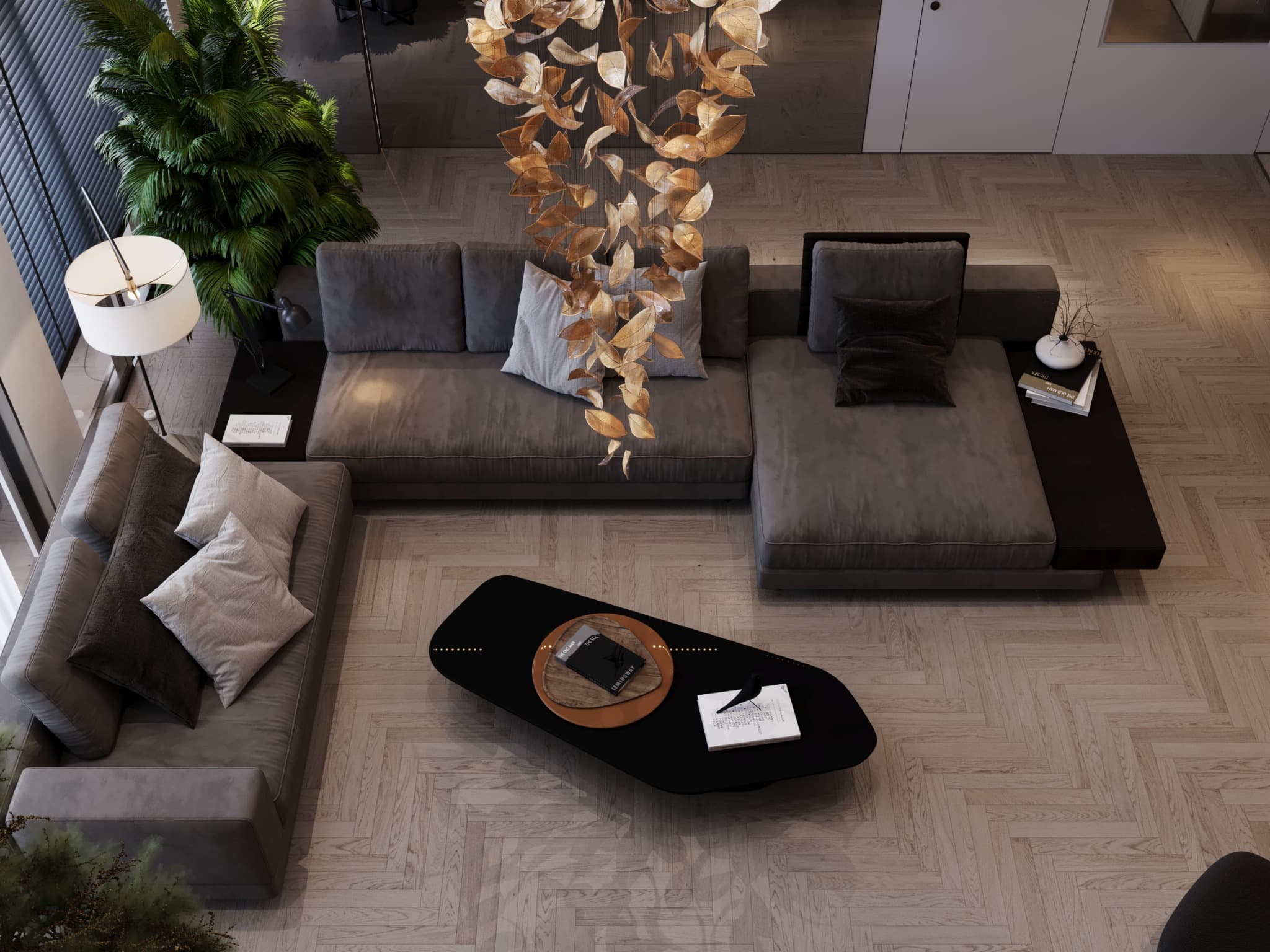 Elevated view of the sofas, central table and pendant