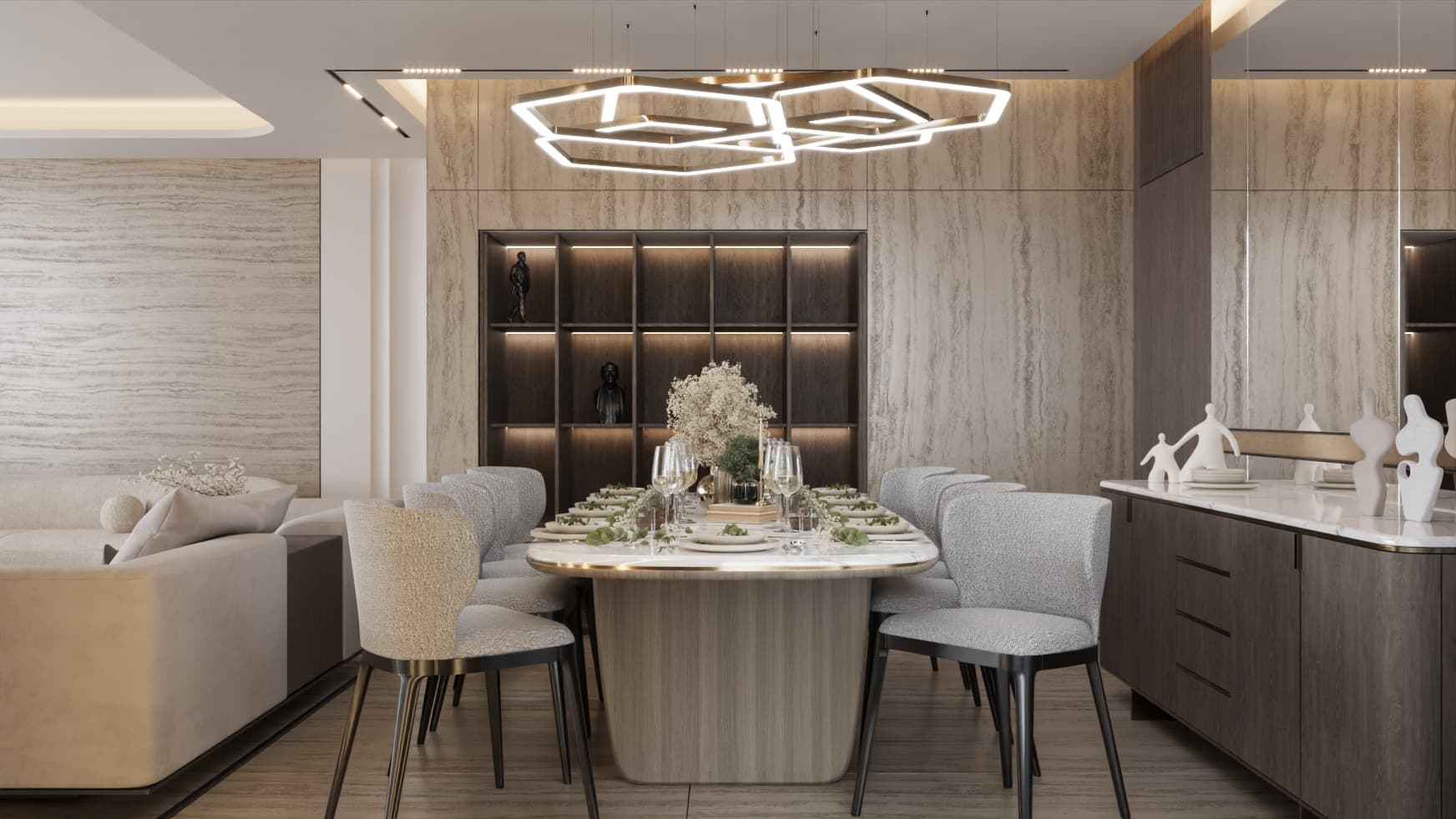 Rounded rectangular dining table and upholstered chairs beneath an angular pendant