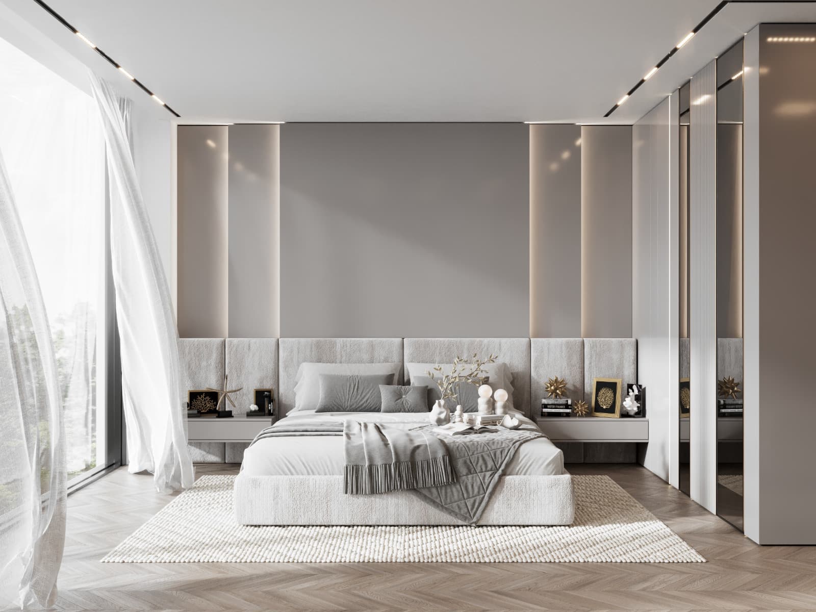 Bedroom with a low upholstered bed against a tall panelled wall in restrained grey