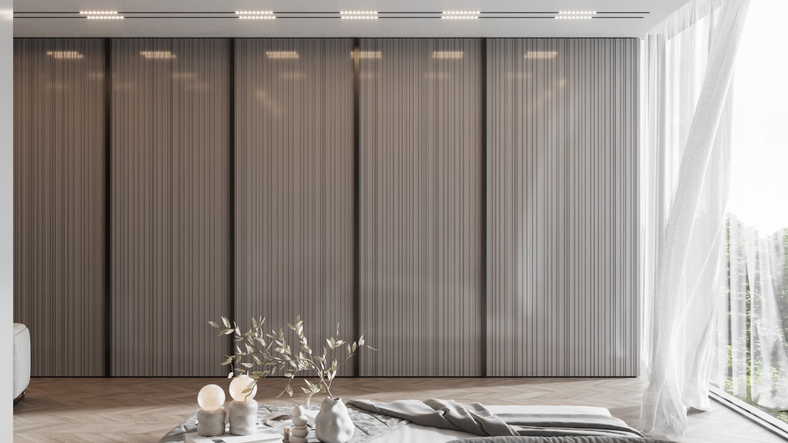 Closed wardrobe fronts forming a continuous vertical rhythm beside a bright window