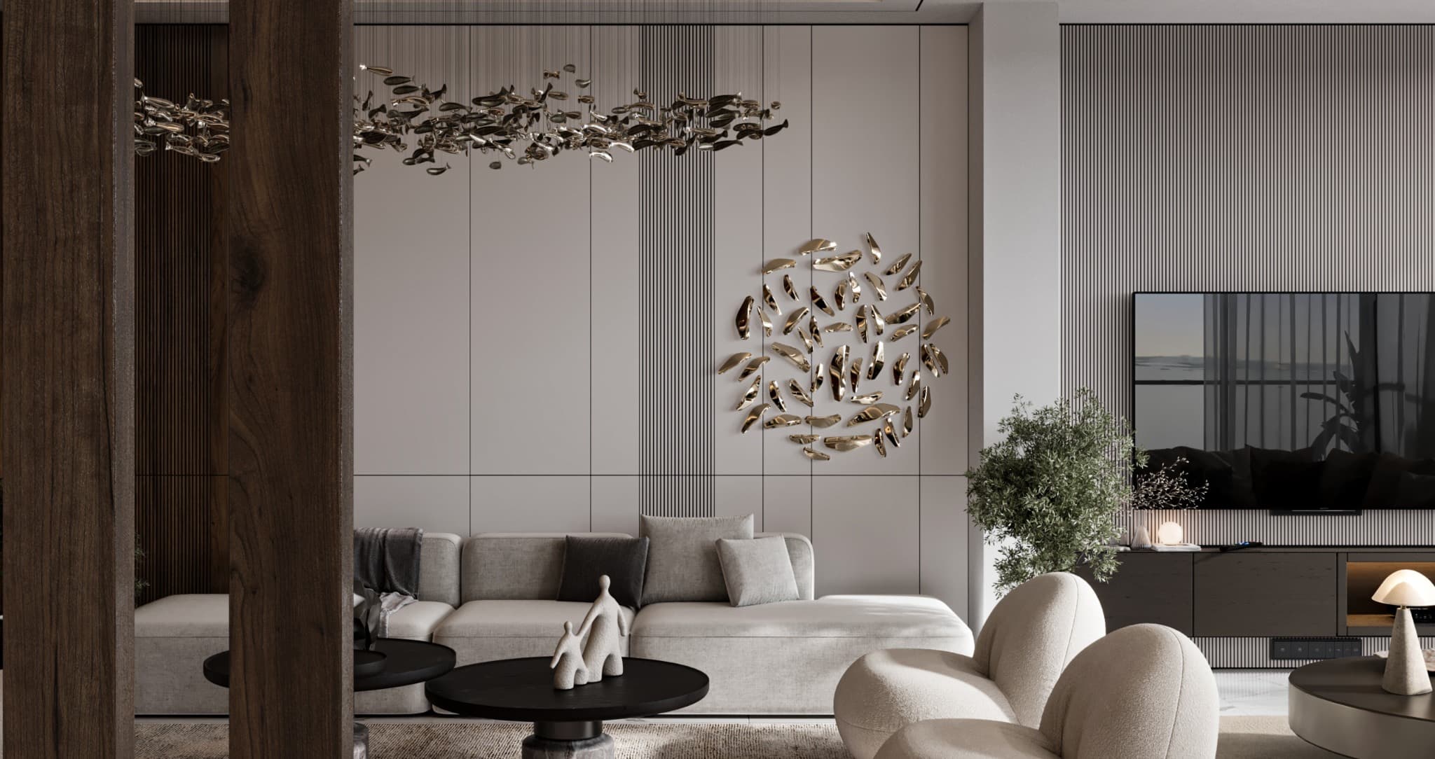 Closer living view bringing the wall sculpture, suspended light and curved chairs into focus