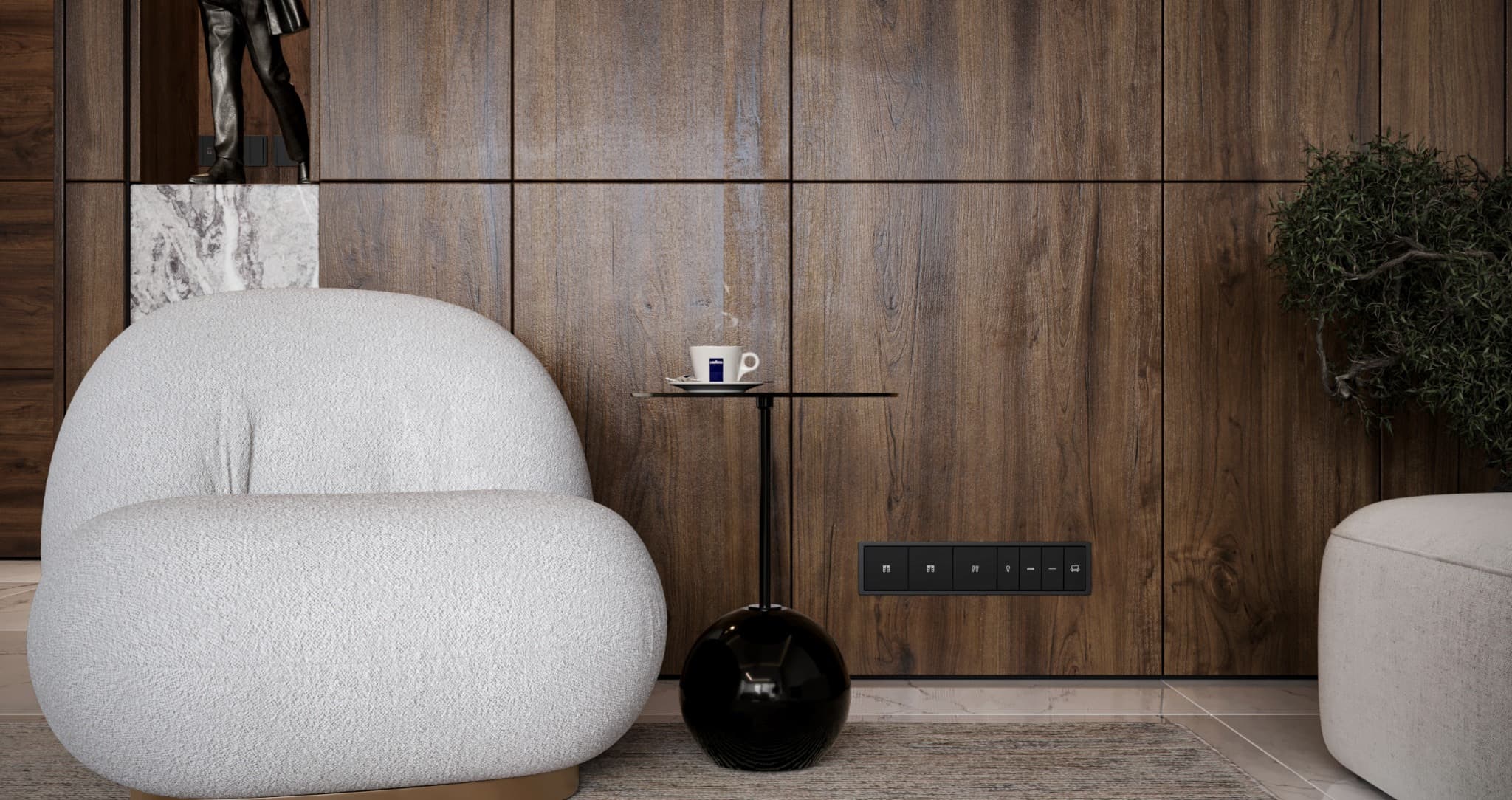 Armchair study showing a rounded back and softly textured upholstery beside a slender side table