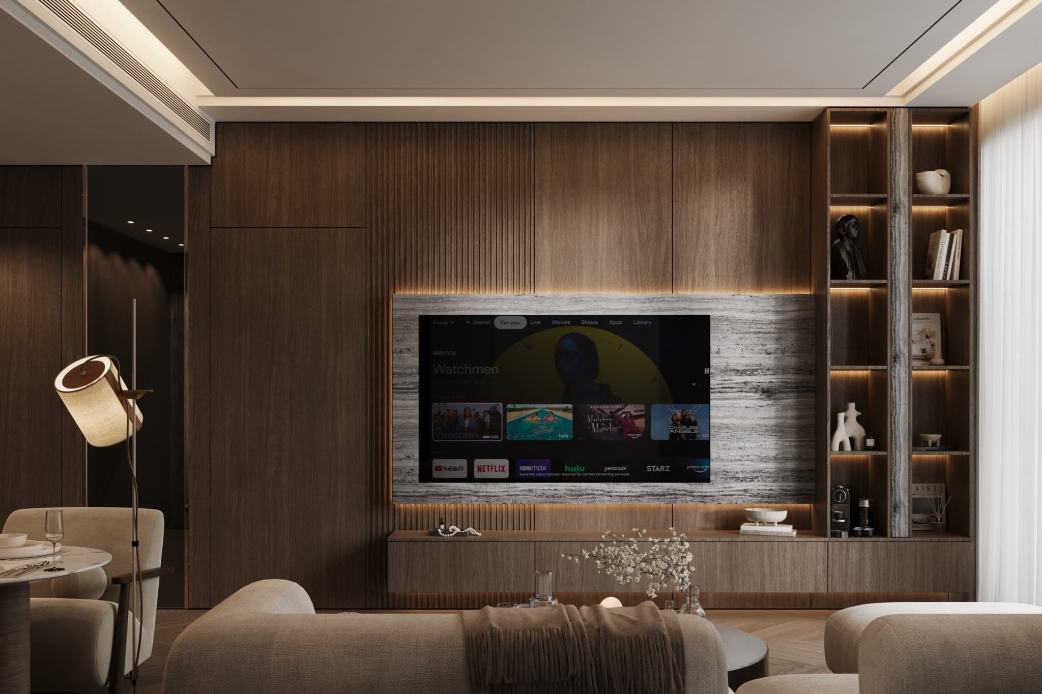 Media wall with stone-effect frame, illuminated shelves and a low timber console