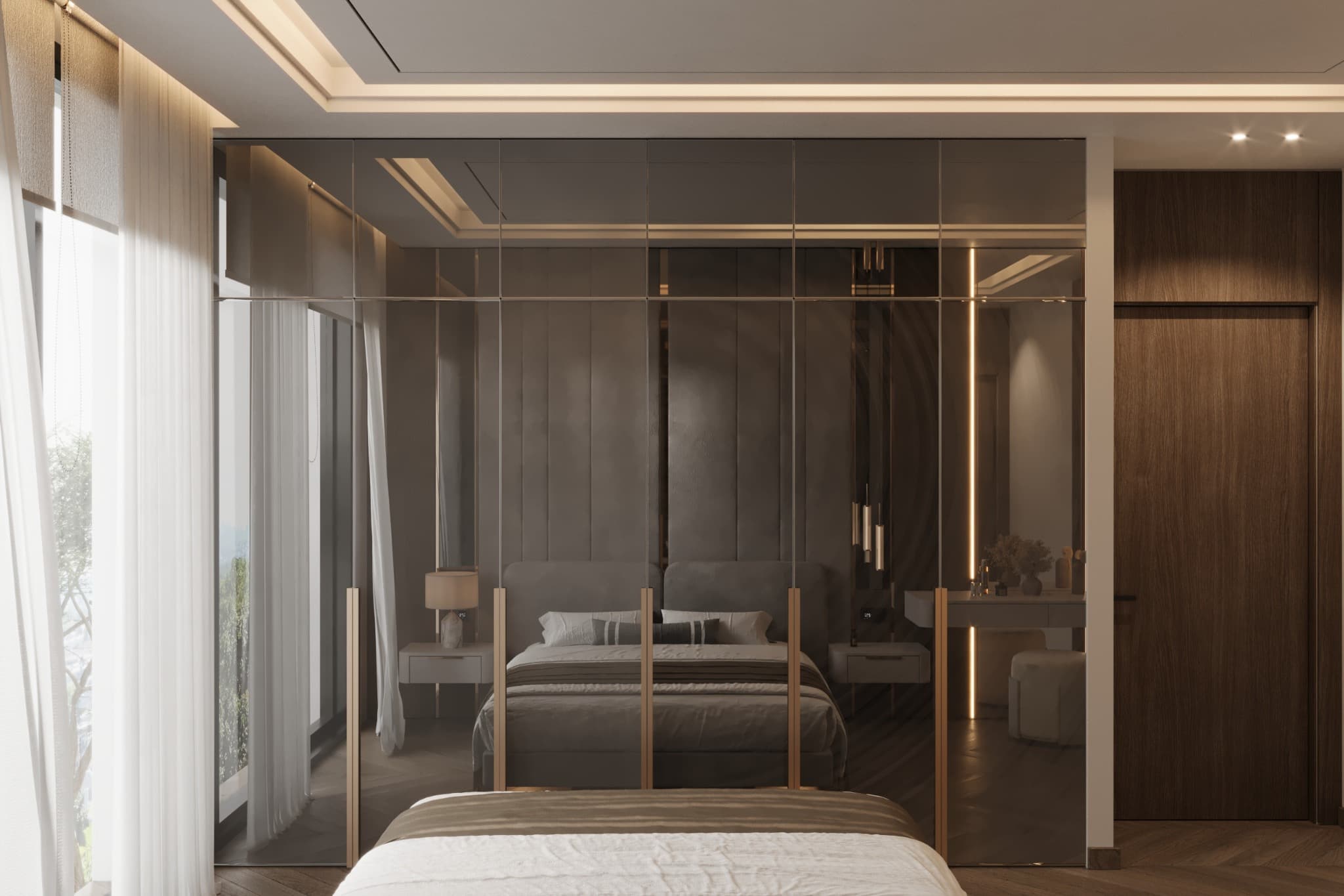 Reflective wardrobe fronts with slender metallic frames beside the bed